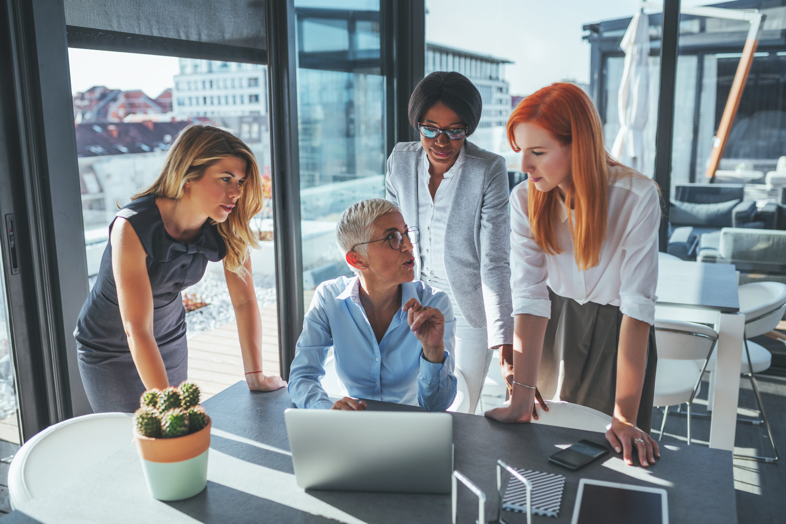 Image of business people interacting with each other during leadership development coaching