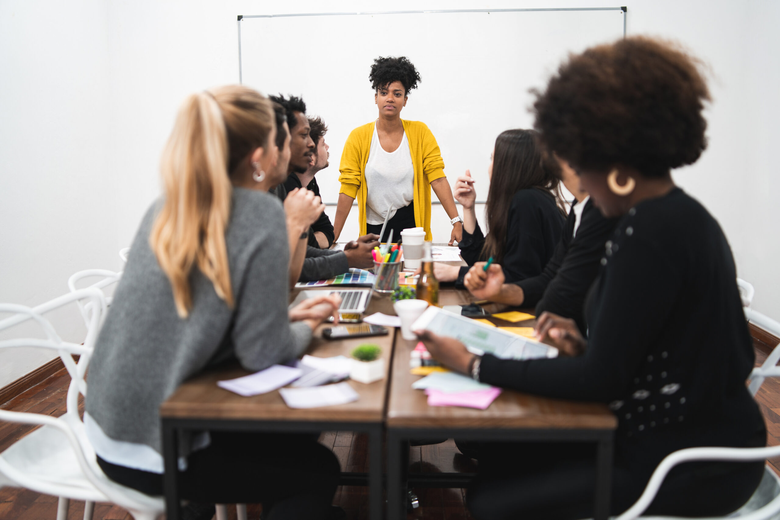 Image of a businessman giving a speech during a coaching engagement